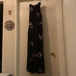 Black with flowers Capri Romper.